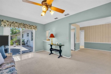 Step into light and bright Florida living with this spacious on Highland Lakes Executive Golf Course in Florida - for sale on GolfHomes.com, golf home, golf lot
