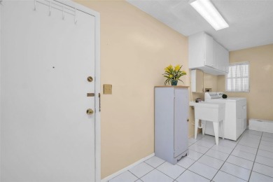 Step into light and bright Florida living with this spacious on Highland Lakes Executive Golf Course in Florida - for sale on GolfHomes.com, golf home, golf lot