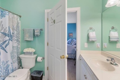 This 3 BR, 2.5 bathroom Osprey Ridge end unit condo in the on Sea Trail Golf Resort in North Carolina - for sale on GolfHomes.com, golf home, golf lot