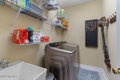 This 3 BR, 2.5 bathroom Osprey Ridge end unit condo in the on Sea Trail Golf Resort in North Carolina - for sale on GolfHomes.com, golf home, golf lot