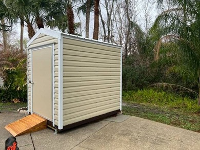 This shaded RV site includes a 20'x20' suite with full on The Great Outdoors Golf and Country Club in Florida - for sale on GolfHomes.com, golf home, golf lot