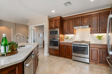 This beautifully maintained SunRiver home features three on Sunriver Golf Club in Utah - for sale on GolfHomes.com, golf home, golf lot