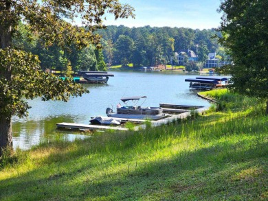 Stunning Lake Oconee view, Assigned Slip and Pond frontage all on Harbor Club Golf and Country Club in Georgia - for sale on GolfHomes.com, golf home, golf lot