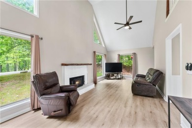 This stunning home offers privacy and views of Lake Arrowhead on The Highlands Course at Lake Arrowhead in Georgia - for sale on GolfHomes.com, golf home, golf lot