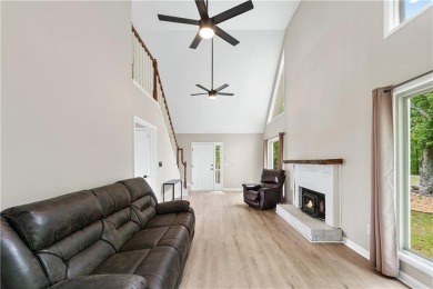 This stunning home offers privacy and views of Lake Arrowhead on The Highlands Course at Lake Arrowhead in Georgia - for sale on GolfHomes.com, golf home, golf lot