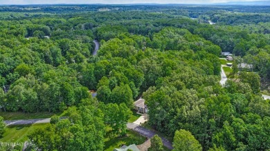 Check out this great home with beautiful views located right on Lake Tansi Village Country Club in Tennessee - for sale on GolfHomes.com, golf home, golf lot