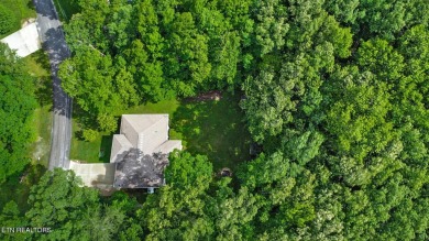 Check out this great home with beautiful views located right on Lake Tansi Village Country Club in Tennessee - for sale on GolfHomes.com, golf home, golf lot