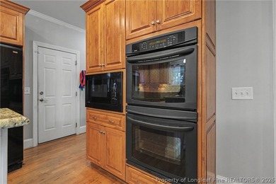 Welcome to this stunning executive all-brick home, tucked behind on Anderson Creek Golf Club in North Carolina - for sale on GolfHomes.com, golf home, golf lot