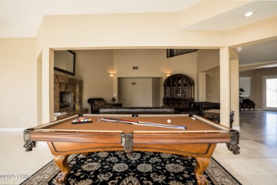 Nestled on the 4th fairway, this stunning 5,577 sq. ft. estate on London Bridge Golf Course in Arizona - for sale on GolfHomes.com, golf home, golf lot
