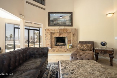 Nestled on the 4th fairway, this stunning 5,577 sq. ft. estate on London Bridge Golf Course in Arizona - for sale on GolfHomes.com, golf home, golf lot