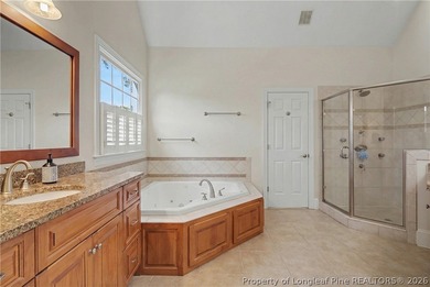 Welcome to this stunning executive all-brick home, tucked behind on Anderson Creek Golf Club in North Carolina - for sale on GolfHomes.com, golf home, golf lot