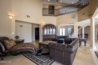 Nestled on the 4th fairway, this stunning 5,577 sq. ft. estate on London Bridge Golf Course in Arizona - for sale on GolfHomes.com, golf home, golf lot