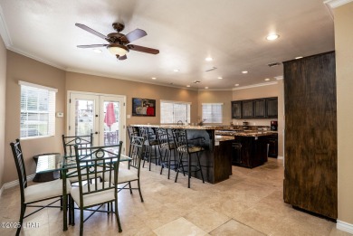 Nestled on the 4th fairway, this stunning 5,577 sq. ft. estate on London Bridge Golf Course in Arizona - for sale on GolfHomes.com, golf home, golf lot