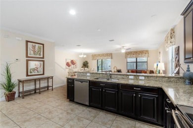Introducing an exceptional turnkey rental property that promises on The Oasis Club at Champions Gate in Florida - for sale on GolfHomes.com, golf home, golf lot