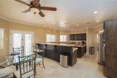 Nestled on the 4th fairway, this stunning 5,577 sq. ft. estate on London Bridge Golf Course in Arizona - for sale on GolfHomes.com, golf home, golf lot