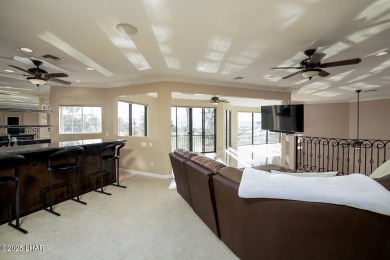 Nestled on the 4th fairway, this stunning 5,577 sq. ft. estate on London Bridge Golf Course in Arizona - for sale on GolfHomes.com, golf home, golf lot
