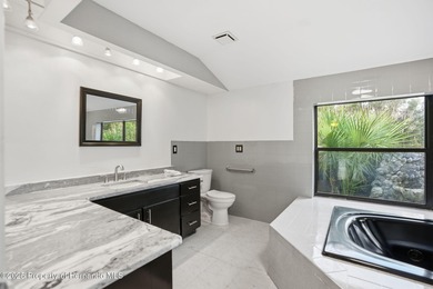 Beautiful Custom Home on Oversized Lot! NEW ROOF FOR BUYER on Brooksville Country Club At Majestic Oaks in Florida - for sale on GolfHomes.com, golf home, golf lot