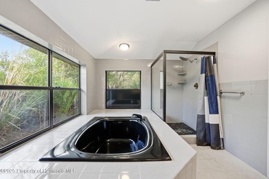 Beautiful Custom Home on Oversized Lot! NEW ROOF FOR BUYER on Brooksville Country Club At Majestic Oaks in Florida - for sale on GolfHomes.com, golf home, golf lot