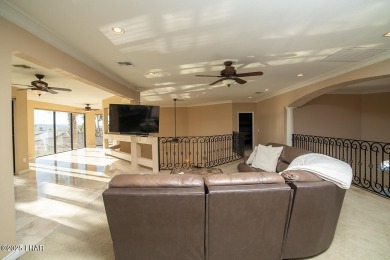 Nestled on the 4th fairway, this stunning 5,577 sq. ft. estate on London Bridge Golf Course in Arizona - for sale on GolfHomes.com, golf home, golf lot