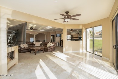 Nestled on the 4th fairway, this stunning 5,577 sq. ft. estate on London Bridge Golf Course in Arizona - for sale on GolfHomes.com, golf home, golf lot