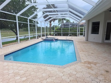 Glen Lakes 3 Bedroom Water Front Pool Home 3 Full Bathrooms And on Glen Lakes Country Club in Florida - for sale on GolfHomes.com, golf home, golf lot