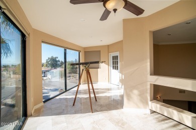 Nestled on the 4th fairway, this stunning 5,577 sq. ft. estate on London Bridge Golf Course in Arizona - for sale on GolfHomes.com, golf home, golf lot