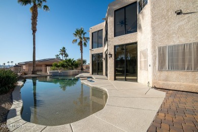 Nestled on the 4th fairway, this stunning 5,577 sq. ft. estate on London Bridge Golf Course in Arizona - for sale on GolfHomes.com, golf home, golf lot
