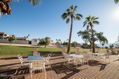 Nestled on the 4th fairway, this stunning 5,577 sq. ft. estate on London Bridge Golf Course in Arizona - for sale on GolfHomes.com, golf home, golf lot