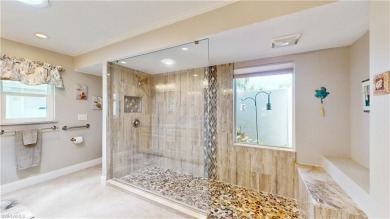 This stunning pool home will BLOW YOUR SOCKS OFF! Panoramic on Spanish Wells Golf and Country Club in Florida - for sale on GolfHomes.com, golf home, golf lot