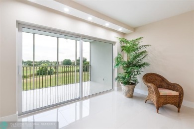 NOTHING HAS BEEN SPARED IN THIS BEAUTIFULLY FULLY RENOVATED AND on Palm-Aire Country Club and Resort - Palms in Florida - for sale on GolfHomes.com, golf home, golf lot