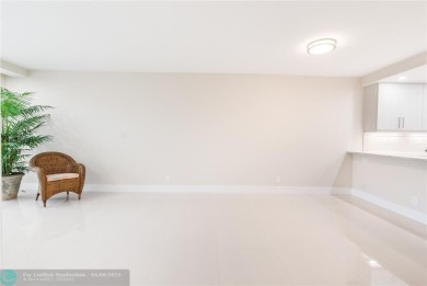 NOTHING HAS BEEN SPARED IN THIS BEAUTIFULLY FULLY RENOVATED AND on Palm-Aire Country Club and Resort - Palms in Florida - for sale on GolfHomes.com, golf home, golf lot