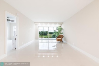 NOTHING HAS BEEN SPARED IN THIS BEAUTIFULLY FULLY RENOVATED AND on Palm-Aire Country Club and Resort - Palms in Florida - for sale on GolfHomes.com, golf home, golf lot