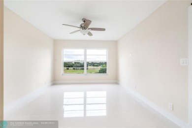 NOTHING HAS BEEN SPARED IN THIS BEAUTIFULLY FULLY RENOVATED AND on Palm-Aire Country Club and Resort - Palms in Florida - for sale on GolfHomes.com, golf home, golf lot