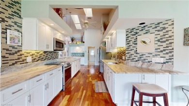 This stunning pool home will BLOW YOUR SOCKS OFF! Panoramic on Spanish Wells Golf and Country Club in Florida - for sale on GolfHomes.com, golf home, golf lot