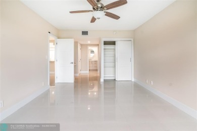 NOTHING HAS BEEN SPARED IN THIS BEAUTIFULLY FULLY RENOVATED AND on Palm-Aire Country Club and Resort - Palms in Florida - for sale on GolfHomes.com, golf home, golf lot