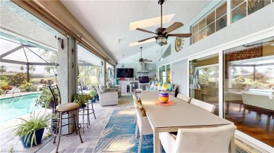 This stunning pool home will BLOW YOUR SOCKS OFF! Panoramic on Spanish Wells Golf and Country Club in Florida - for sale on GolfHomes.com, golf home, golf lot