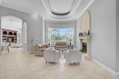 **ELEGANT UPDATED RESIDENCE IN THE OAKS | MODERN COMFORT ON A on The Oaks Club in Florida - for sale on GolfHomes.com, golf home, golf lot