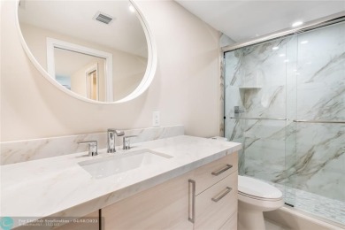 NOTHING HAS BEEN SPARED IN THIS BEAUTIFULLY FULLY RENOVATED AND on Palm-Aire Country Club and Resort - Palms in Florida - for sale on GolfHomes.com, golf home, golf lot