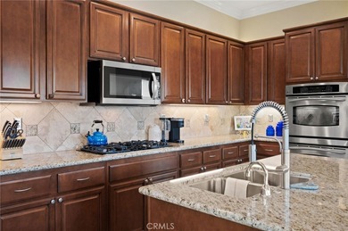 Premier Tamarisk model overlooking the 11th green of Trilogy on Golf Club At La Quinta in California - for sale on GolfHomes.com, golf home, golf lot
