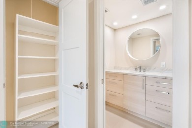NOTHING HAS BEEN SPARED IN THIS BEAUTIFULLY FULLY RENOVATED AND on Palm-Aire Country Club and Resort - Palms in Florida - for sale on GolfHomes.com, golf home, golf lot