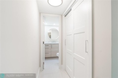 NOTHING HAS BEEN SPARED IN THIS BEAUTIFULLY FULLY RENOVATED AND on Palm-Aire Country Club and Resort - Palms in Florida - for sale on GolfHomes.com, golf home, golf lot