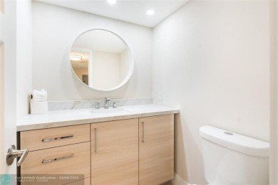 NOTHING HAS BEEN SPARED IN THIS BEAUTIFULLY FULLY RENOVATED AND on Palm-Aire Country Club and Resort - Palms in Florida - for sale on GolfHomes.com, golf home, golf lot