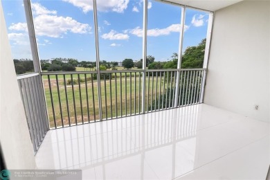 NOTHING HAS BEEN SPARED IN THIS BEAUTIFULLY FULLY RENOVATED AND on Palm-Aire Country Club and Resort - Palms in Florida - for sale on GolfHomes.com, golf home, golf lot