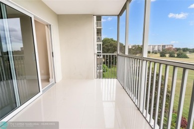 NOTHING HAS BEEN SPARED IN THIS BEAUTIFULLY FULLY RENOVATED AND on Palm-Aire Country Club and Resort - Palms in Florida - for sale on GolfHomes.com, golf home, golf lot