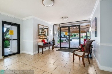 NOTHING HAS BEEN SPARED IN THIS BEAUTIFULLY FULLY RENOVATED AND on Palm-Aire Country Club and Resort - Palms in Florida - for sale on GolfHomes.com, golf home, golf lot
