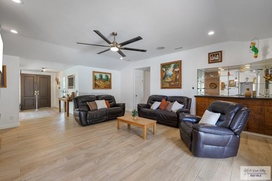 Beautiful 4-bedroom, 5-bath home on a resaca lot in Rancho on Rancho Viejo Resort and Country Club in Texas - for sale on GolfHomes.com, golf home, golf lot