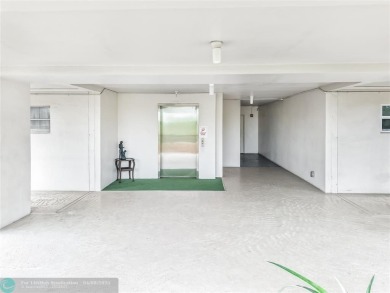 NOTHING HAS BEEN SPARED IN THIS BEAUTIFULLY FULLY RENOVATED AND on Palm-Aire Country Club and Resort - Palms in Florida - for sale on GolfHomes.com, golf home, golf lot