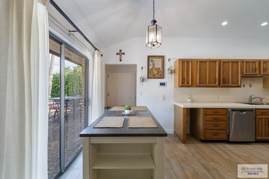 Beautiful 4-bedroom, 5-bath home on a resaca lot in Rancho on Rancho Viejo Resort and Country Club in Texas - for sale on GolfHomes.com, golf home, golf lot