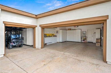 Premier Tamarisk model overlooking the 11th green of Trilogy on Golf Club At La Quinta in California - for sale on GolfHomes.com, golf home, golf lot