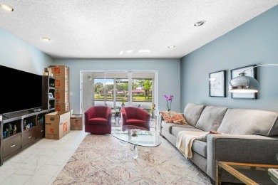 FULLY UPGRADED WATERFRONT FIRST FLOOR UNIT IN SOUGHT AFTER on Boca Lago Golf and Country Club in Florida - for sale on GolfHomes.com, golf home, golf lot